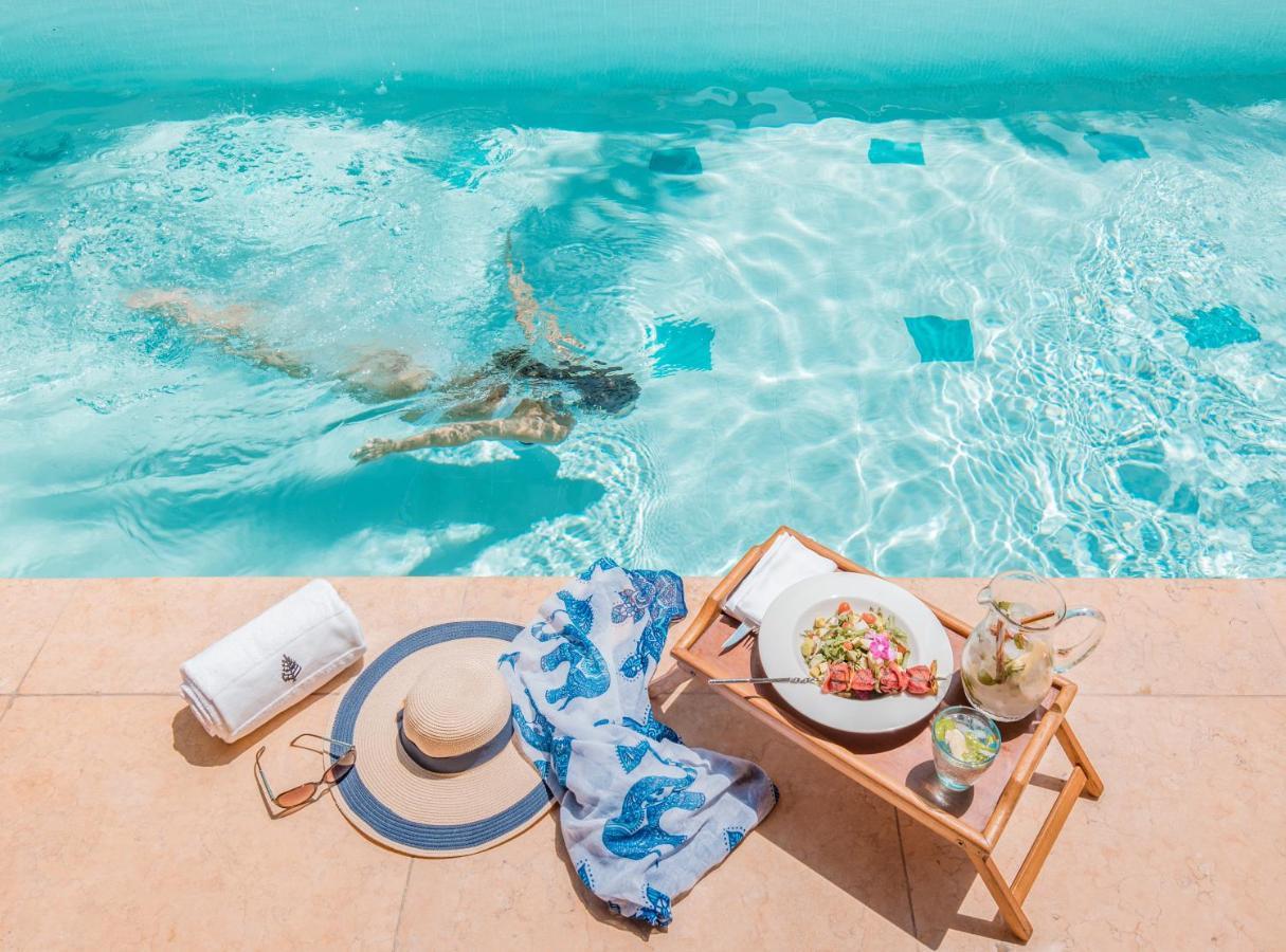 Four Seasons Hotel Cairo At Nile Plaza Esterno foto The swimming pool at the Atlantis Paradise Island